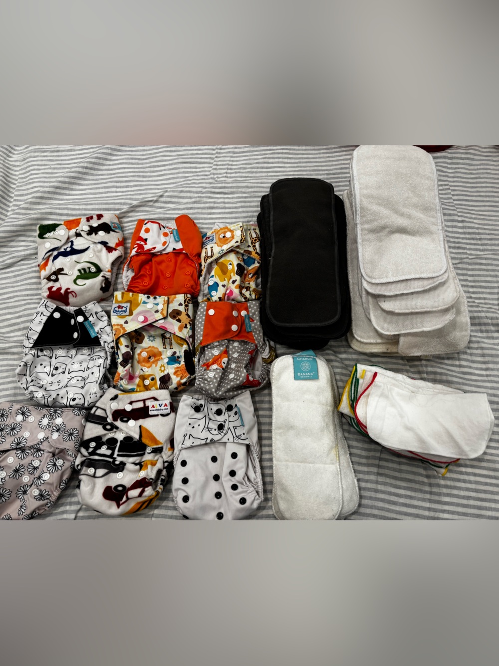 Assorted Cloth Diapers, Inserts, and Wipes